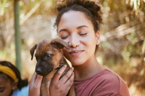 lady hugging dog